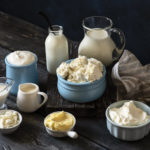 Picture of dairy products on brown table