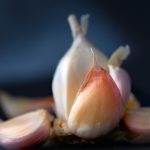 Picture of garlic on a dark table