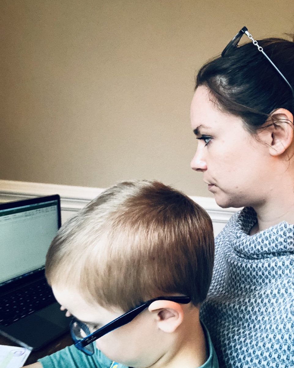 Picture of woman and child sitting at a laptop together