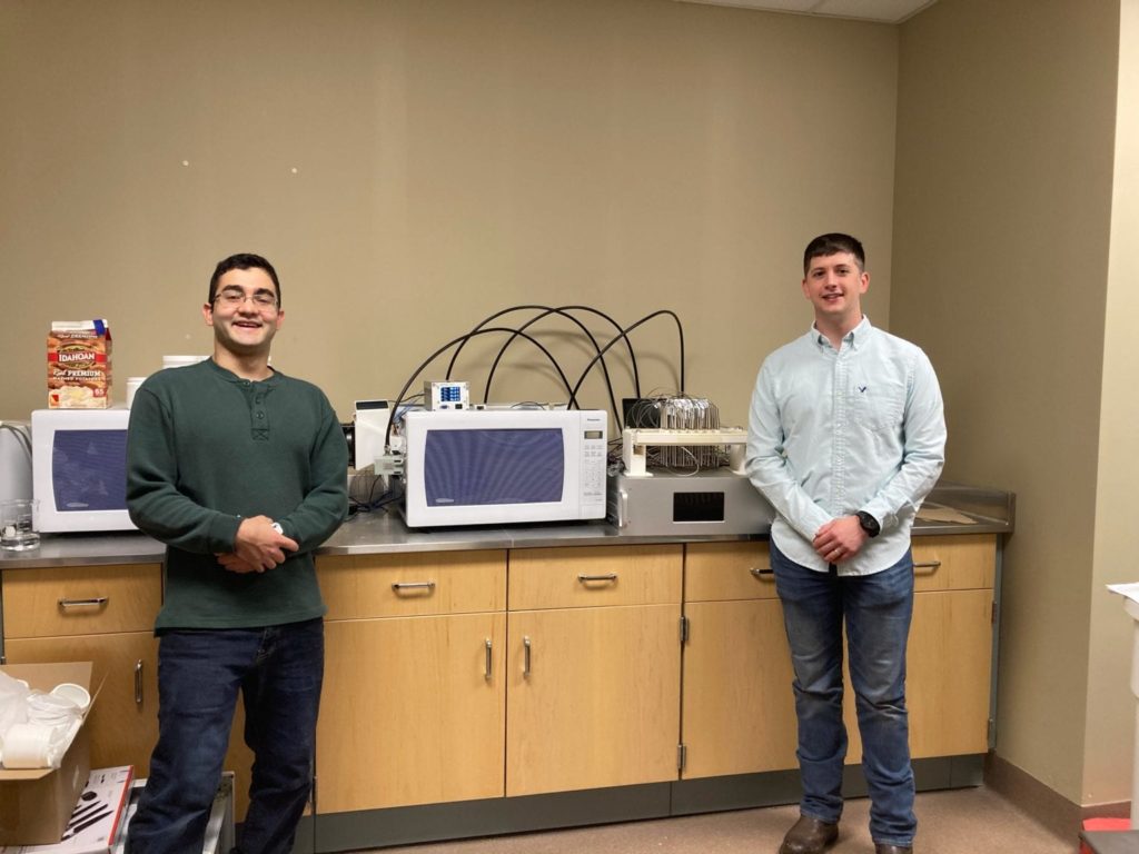 Picture of students with microwave