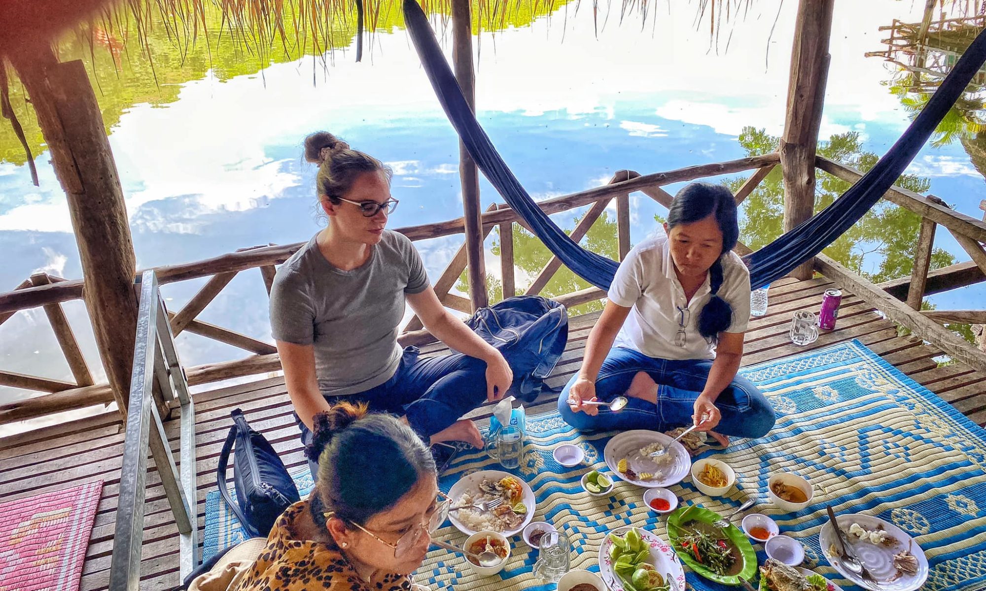 Kristen having lunch with Cambodians