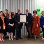Representatives from the Center for Profitable Agriculture and the Tennessee Department of Agriculture pose with a proclamation from Governor Bill Lee commemorating the 25th anniversary of the center.