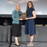 Dana Porter, professor with Texas A&M and president of ASABE (2023-2024), presenting an award to Lori Duncan