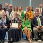 Ruth Henderson McQueen seated in the middle of the the Tennessee Delegation at the 2024 conference of the National Association of Extension 4-H Youth Development Professionals