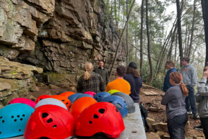 Lecturer Matt Hudson speaking to students about rock climbing in the Obed Wild and Scenic River