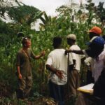 Adam Willcox speaking with local hunters in Cameroon
