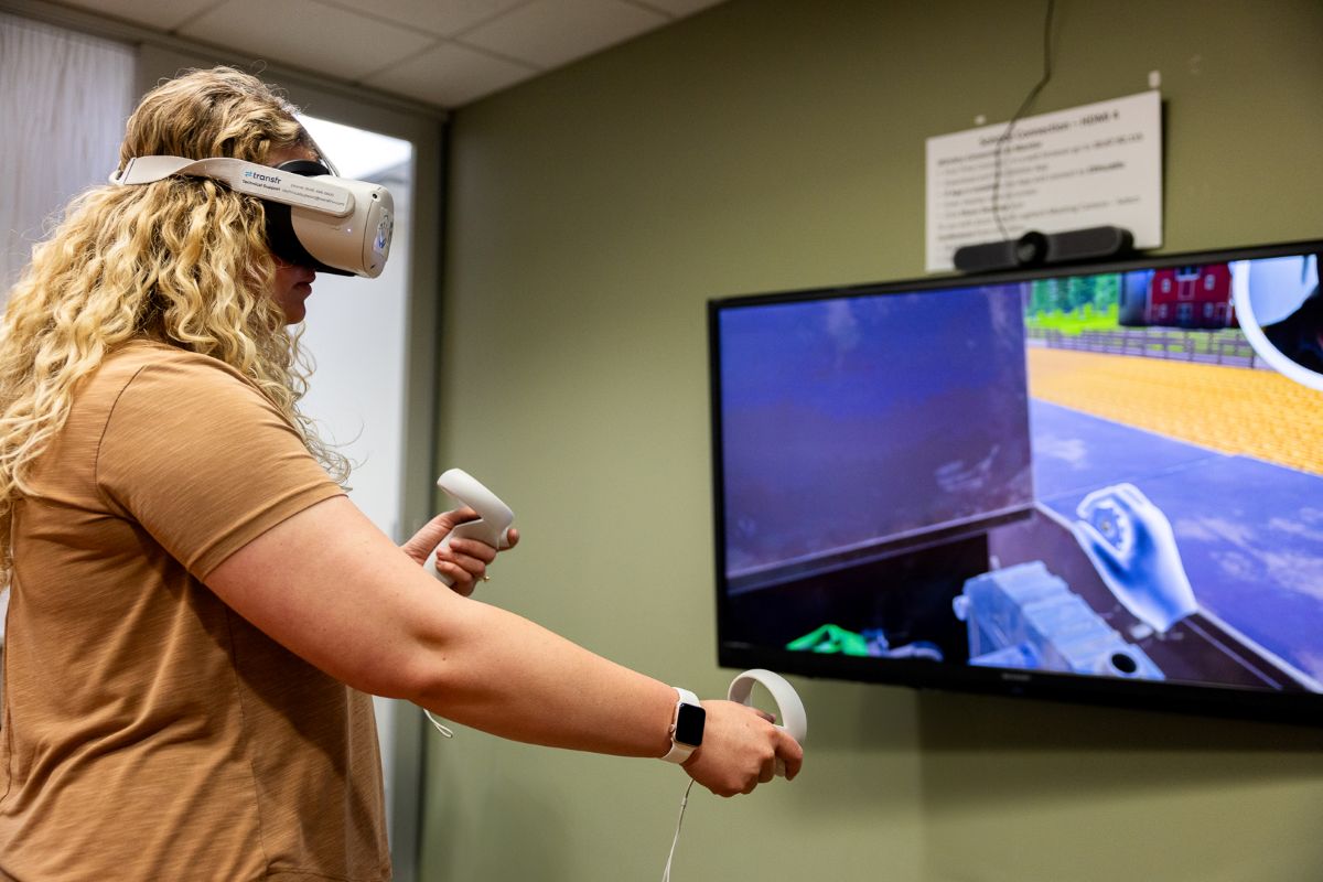 a woman participating in a virtual reality exercise