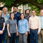 Hurricane Helene flood recovery team of 8 men and women