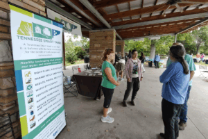 A group of people conversing at a Smart Yards event