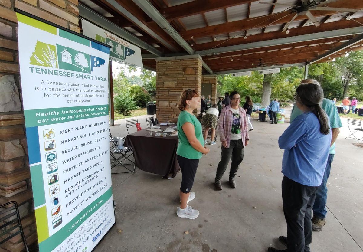 A group of people conversing at a Smart Yards event