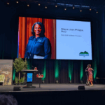 Sharon Jean-Philippe on stage at the International Society of Arboriculture conference