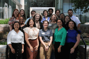 a group of undergraduate students posing in front of the Agriculture and Natural Resources Building