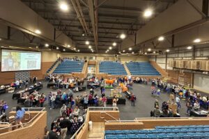 people in the Brehm Animal Science Arena for a horse management field day