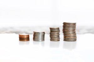 Coins stacked in ascending piles