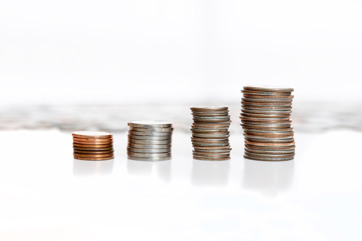 Coins stacked in ascending piles