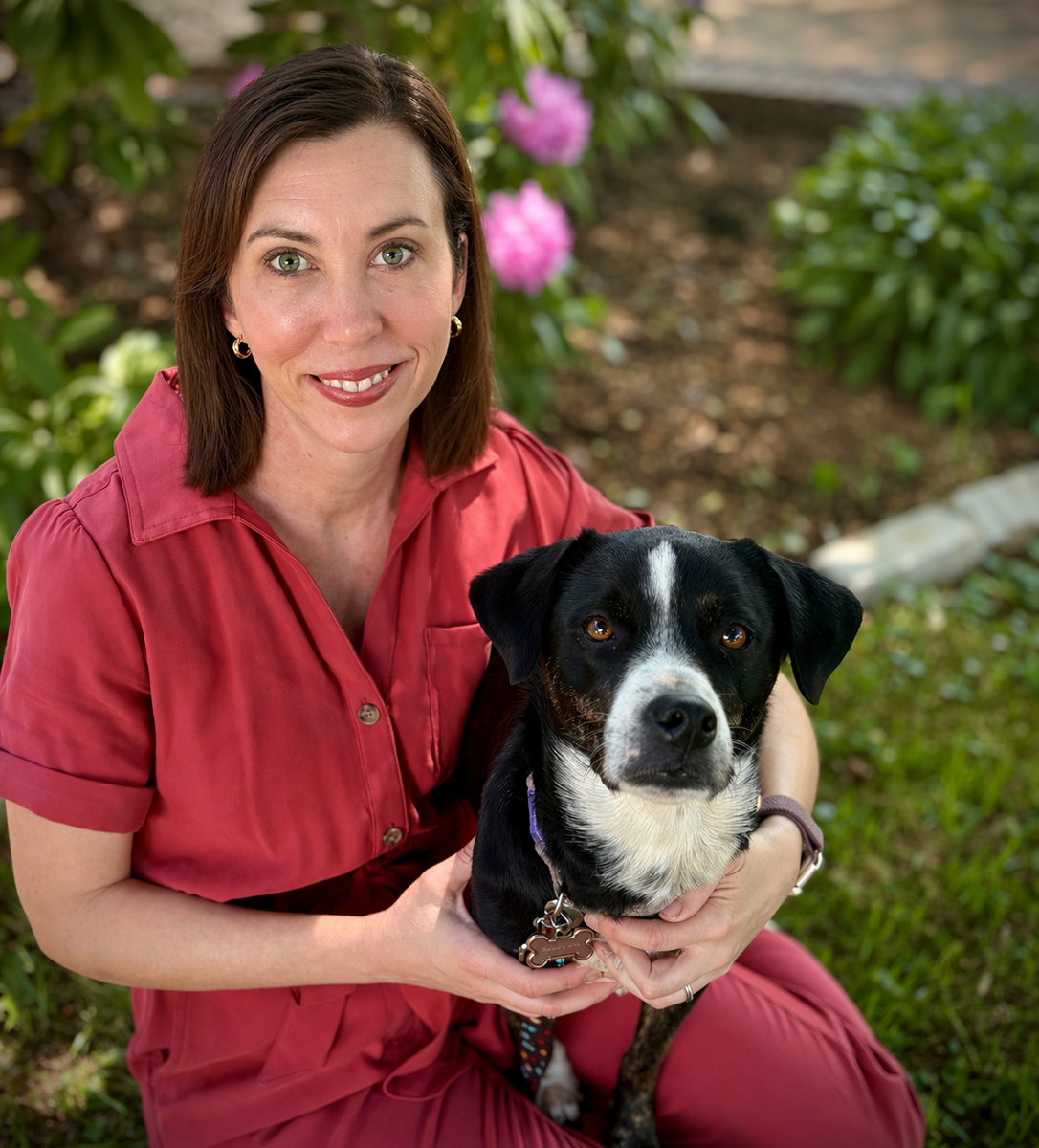 Angela Rollins with her dog, Maggie.