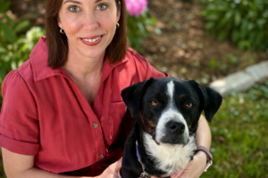 Angela Rollins with her dog, Maggie.