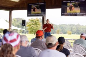 Troy Rowan giving a presentation to a crowd.