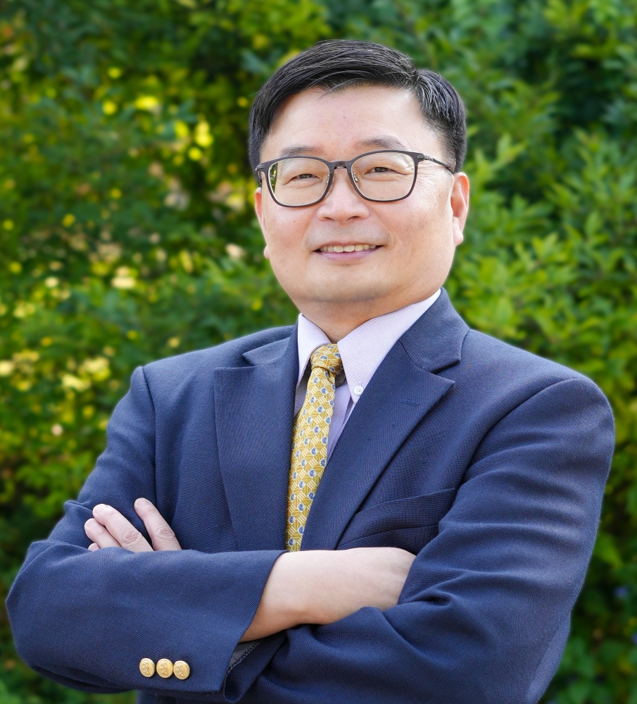 Headshot of T. Edward Yu.