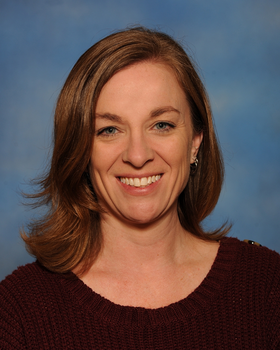 Headshot of Emily Messer.